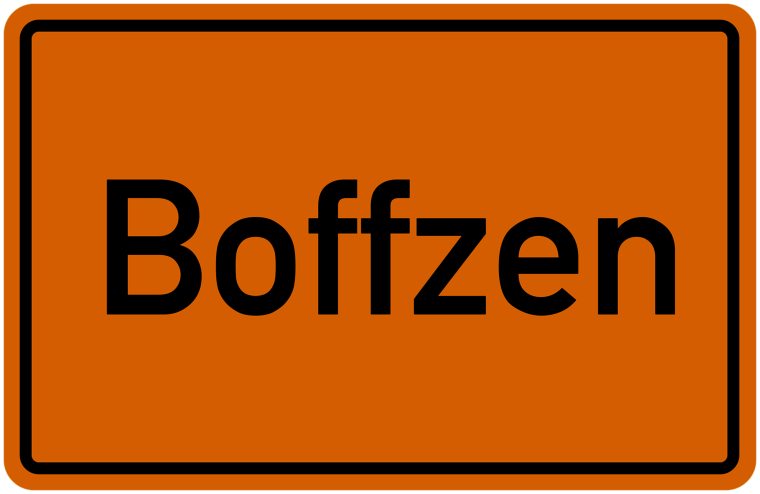 Ortseingangsschild Boffzen - schwarze Schrift auf orangenem Grund